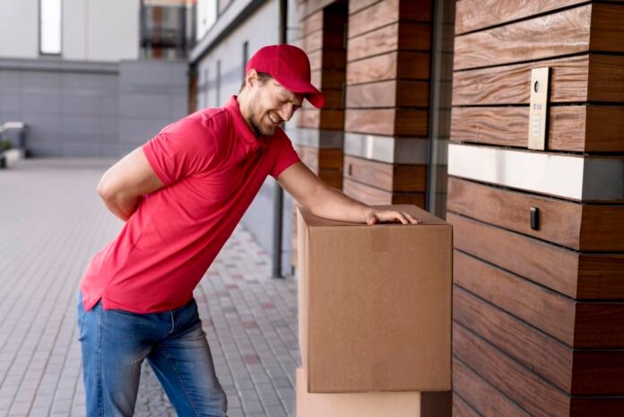 delivery-man-having-back-pain-from-carrying-scaled.jpg